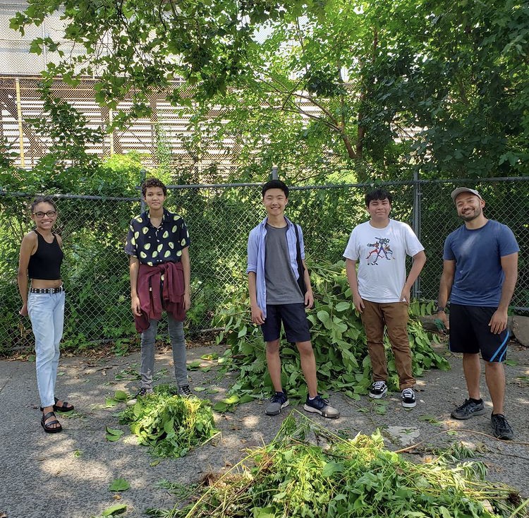Last summer, Theo Lee '22 (center) and other Gardening Club members made several trips to Bronx Science to start weeding and cleaning out the school’s garden. 